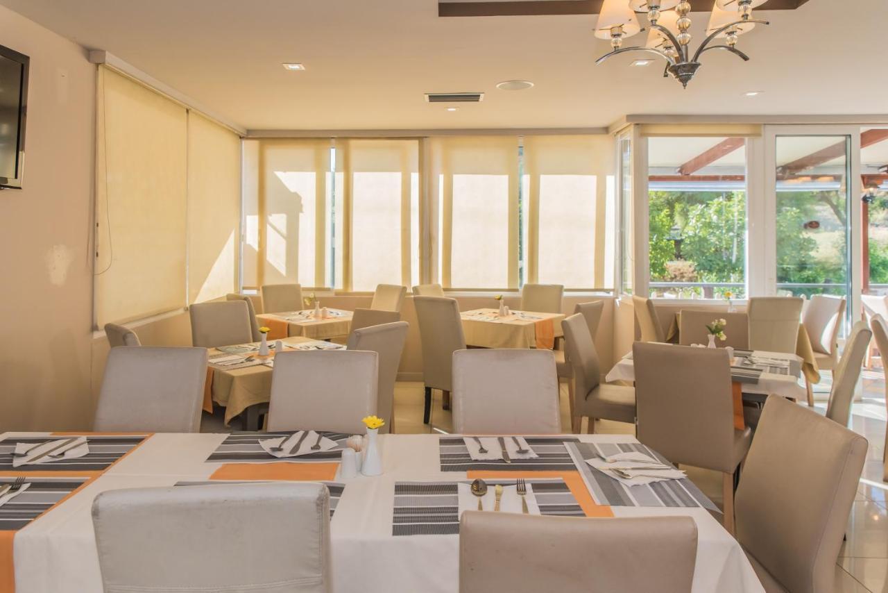 Porto Planos Beach Hotel Екстер'єр фото